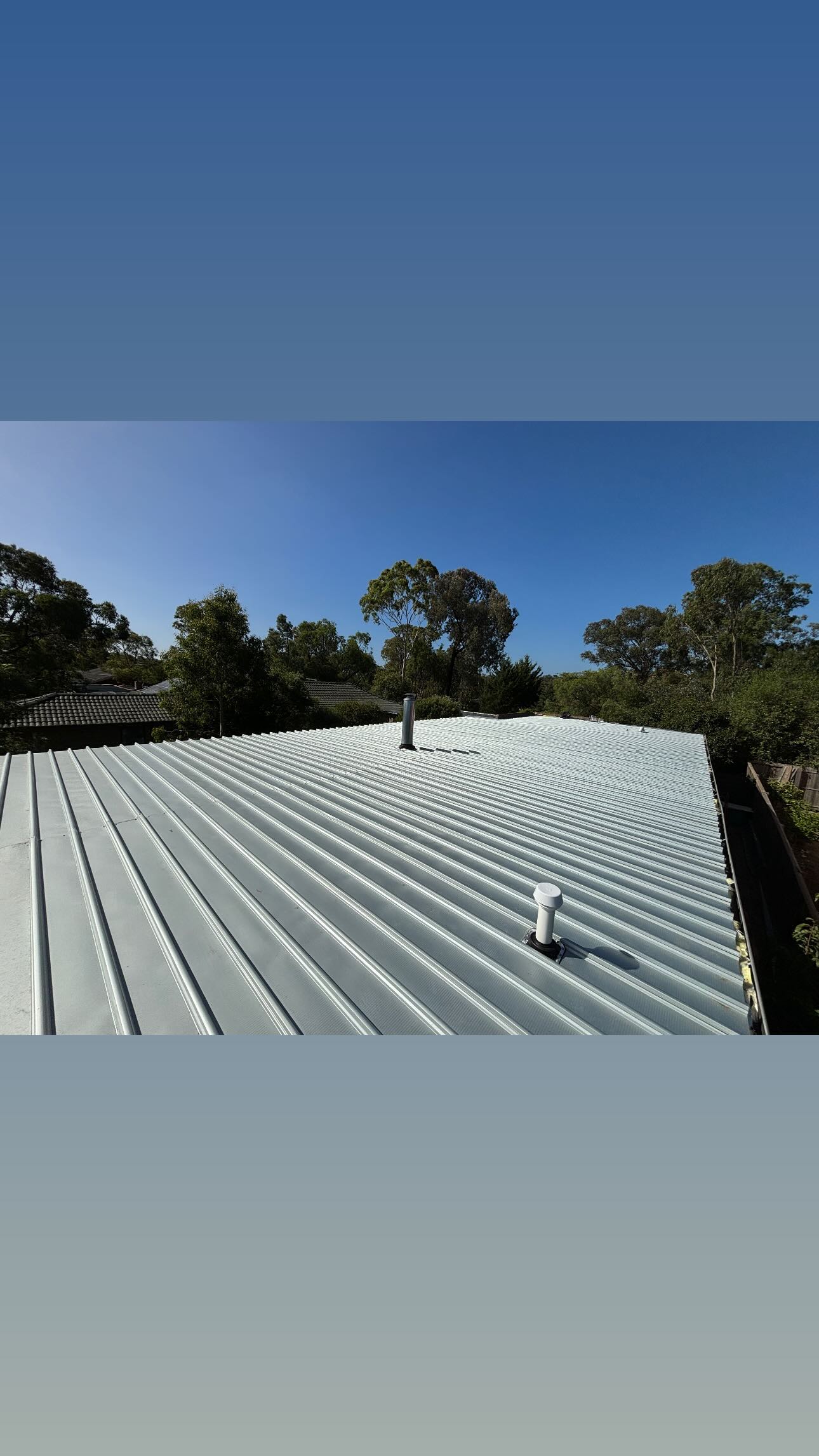 Overhead view of a freshly installed metal roof