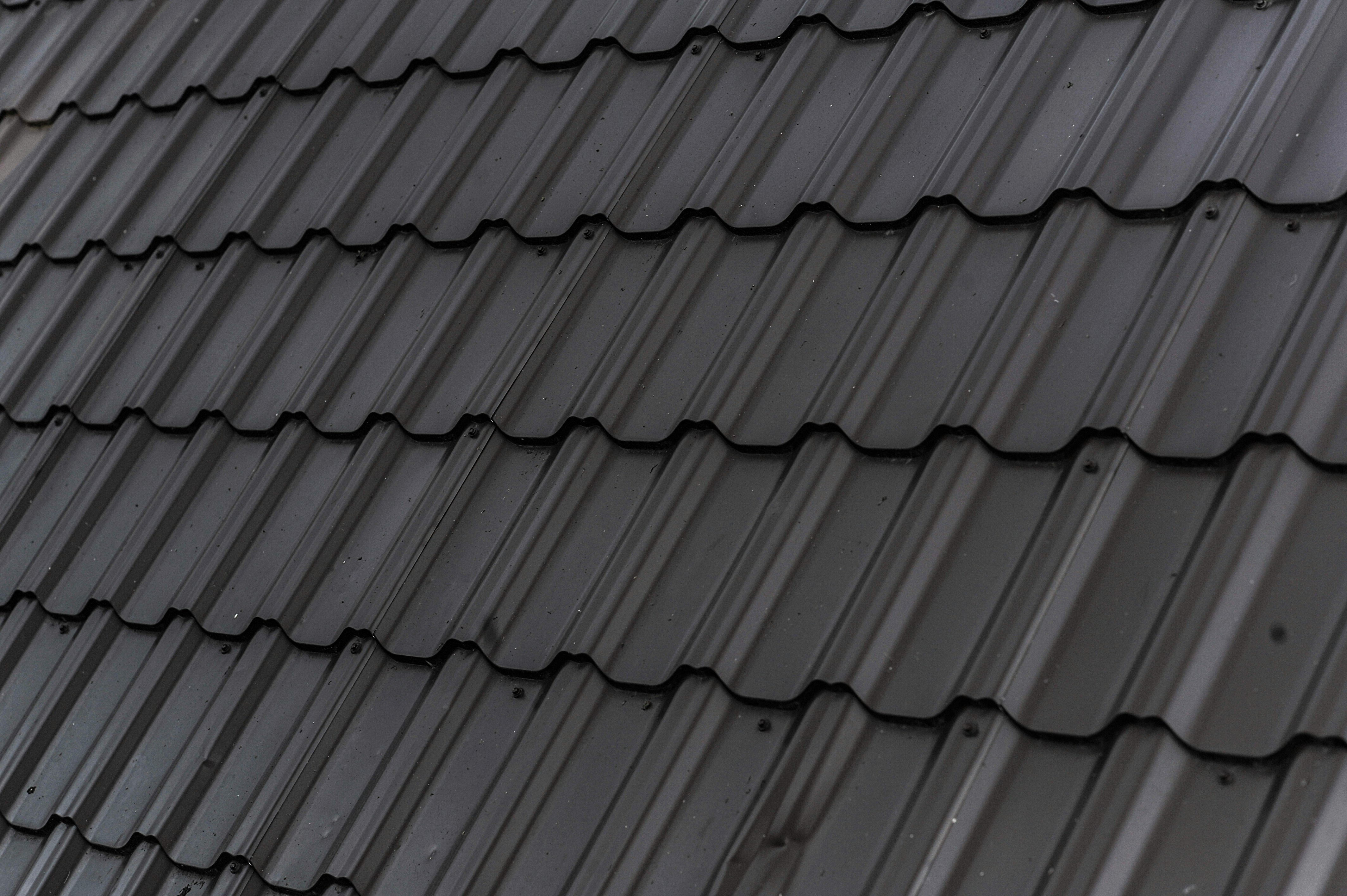 Close detail of dark concrete tile roof